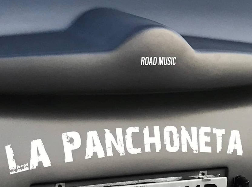 A DJ mixing music on a turntable.