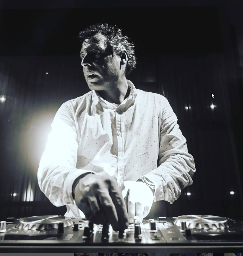 Close-up of DJ equipment with lights.